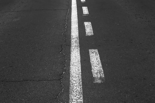 Double white line on asphalt road. Stock Photo