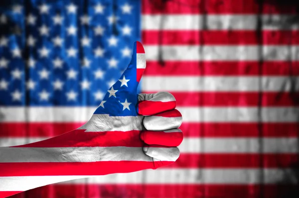 Hand covered in flag of USA. — Stock Photo, Image