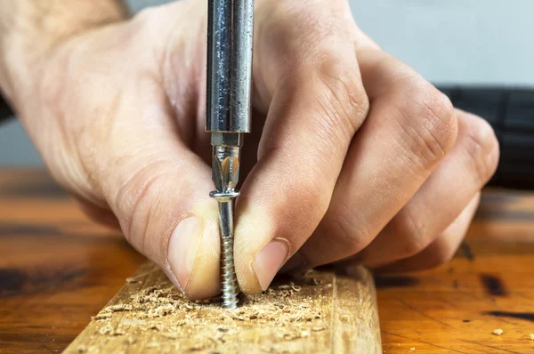 Screwing a screw — Stock Photo, Image