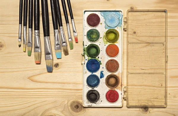 Watercolors and brushes — Stock Photo, Image