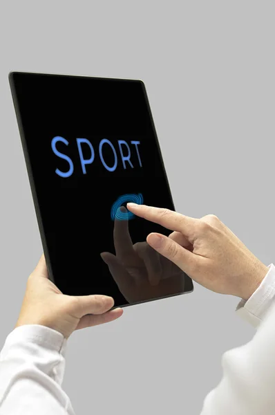 Sport message on digital tablet computer display. Woman hands wi — Stock Photo, Image