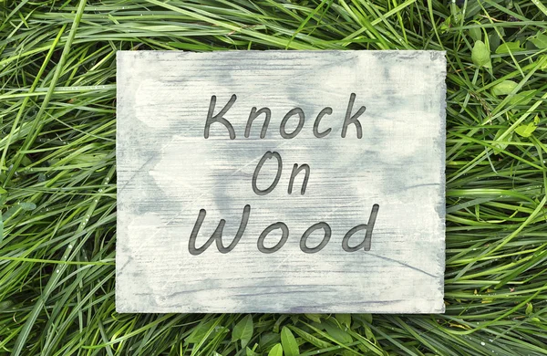 Knock On Wood sign Stock Image