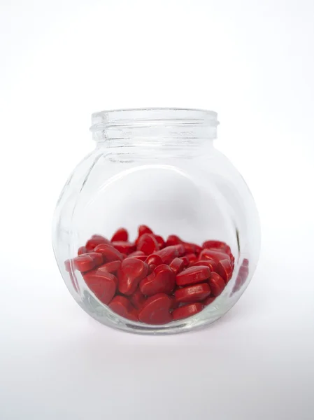 Glass Jar with Hearts Stock Photo
