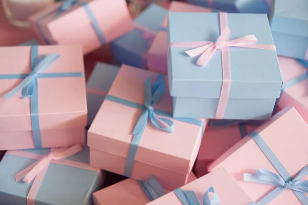 Beautiful gift boxes with ribbons — Stock Photo, Image