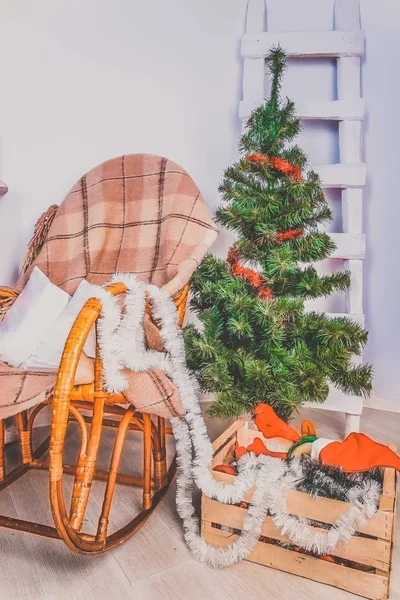 Fir tree with rocking chair — Stock Photo, Image