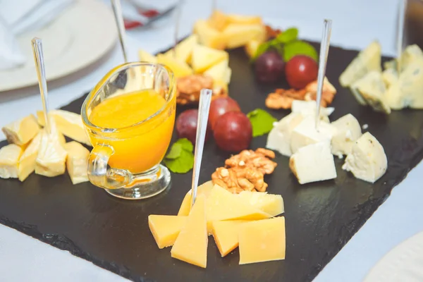 Cheese canape on skewers — Stock Photo, Image