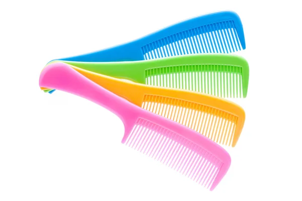 Stack of colorful hair comb  on white background. — Stock Photo, Image