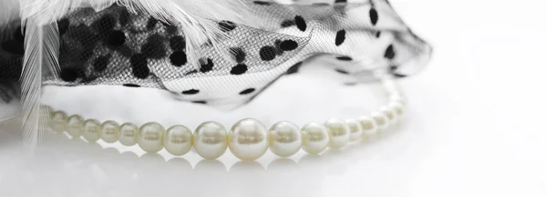Decoration pearl and lace on white background. — Stock Photo, Image