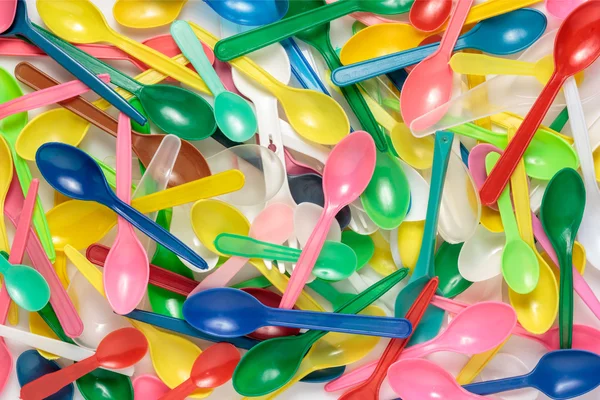 Group of colourful plastic spoons. — Stock Photo, Image