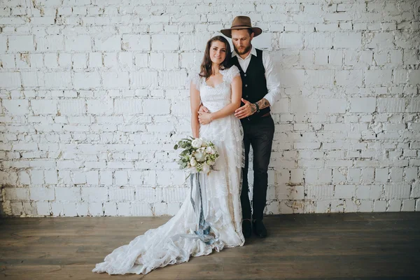 Girl in wedding dress and handsome man — Stock Photo, Image