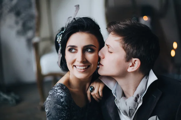 Beautiful bride and groom hugging — Stock Photo, Image