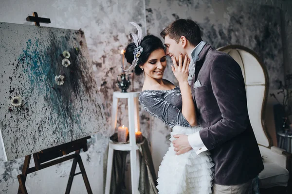 Beautiful bride and groom hugging — Stock Photo, Image