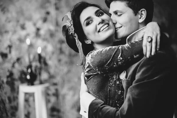 Beautiful bride and groom hugging — Stock Photo, Image