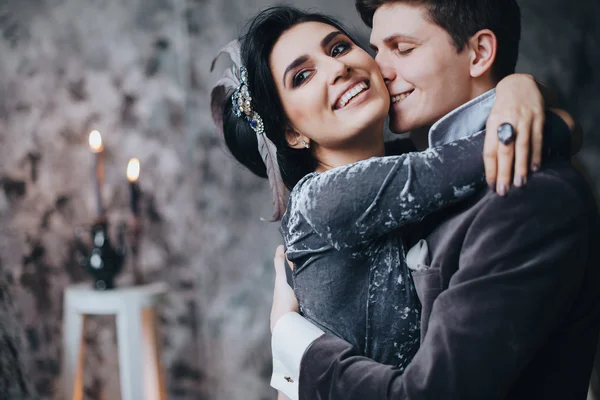 Beautiful bride and groom hugging — Stock Photo, Image