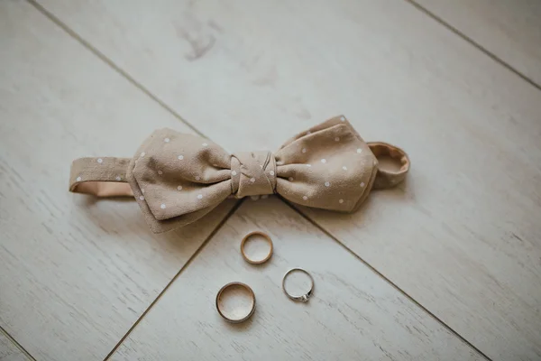 Bowtie and wedding rings — Stock Photo, Image