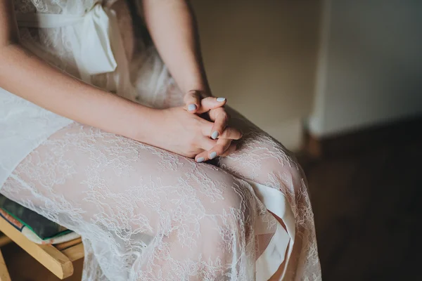 Bride on preparation sitting in a chair — Stock Photo, Image