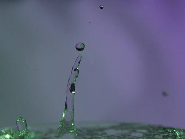 Аннотация Colors Colliding Drops Different Fluids Funds Forms — стоковое фото