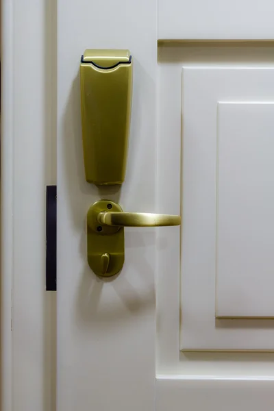 Modern metal knob on white door — Stock Photo, Image