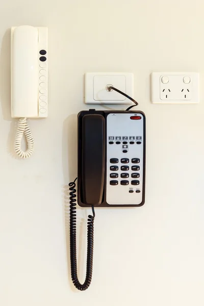Interfone casa pendurado em um wal branco — Fotografia de Stock