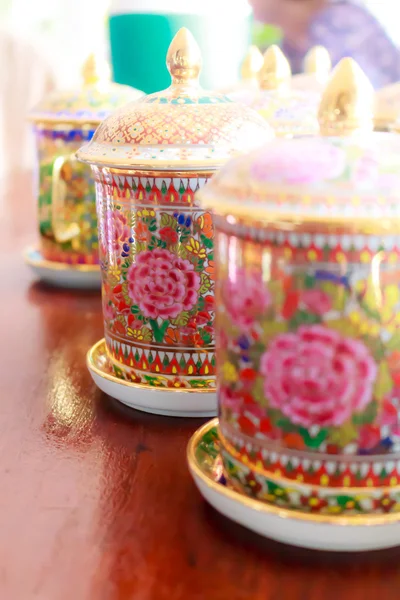 Coffee cups with antique Thai pattern — Stock Photo, Image