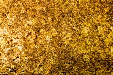 Buda heykeli ile altın yaprak dolu