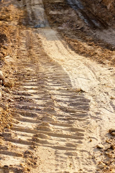 Wheel track and foot print — Stock Photo, Image