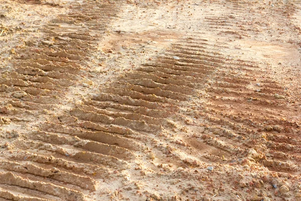 Wheel track and foot print — Stock Photo, Image