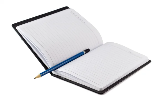 Blue pencil on black leather moleskin notebook — Stock Photo, Image