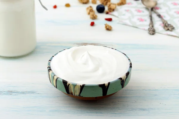 Greek yogurt in pot — Stock Photo, Image