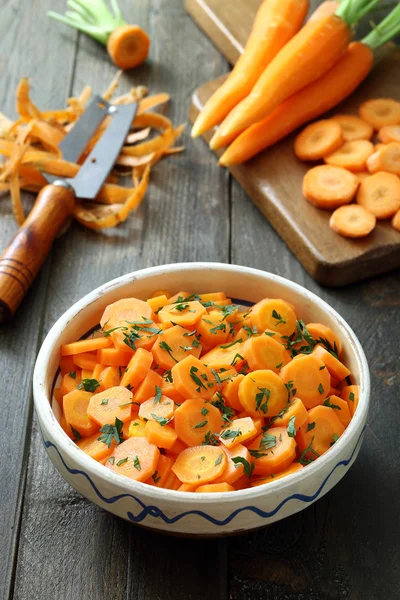 Sliced and whole carrots — Stock Photo, Image