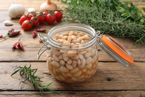 Boiled white beans in glass jar — Stock Photo, Image