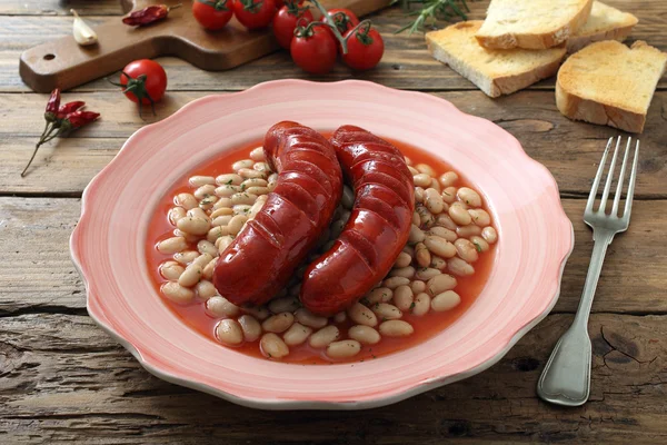 Roasted sausages and white beans — Stock Photo, Image