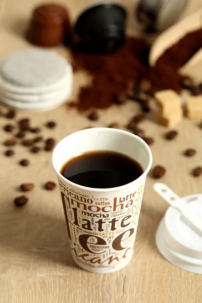 Coffee cup on wooden table — Stock Photo, Image