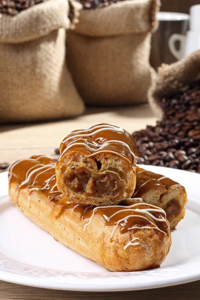 Sweet pastry with coffee cream — Stock Photo, Image