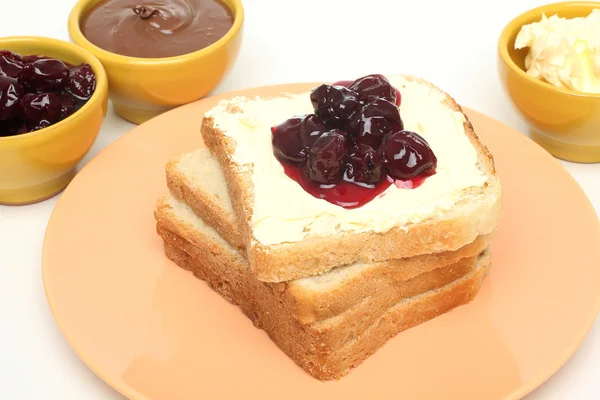 Toasts  and cherry jam — Stock Photo, Image