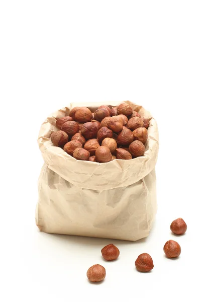 Hazelnuts in paper bag — Stock Photo, Image