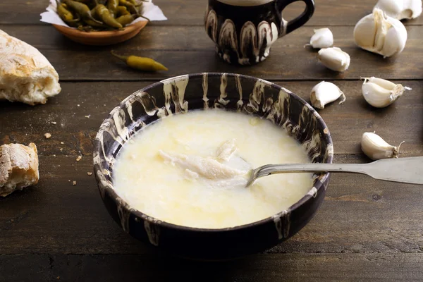 Tripe soup on rustic wooden table background — Stock Image Tripe soup on rustic wooden table background Stock Photo