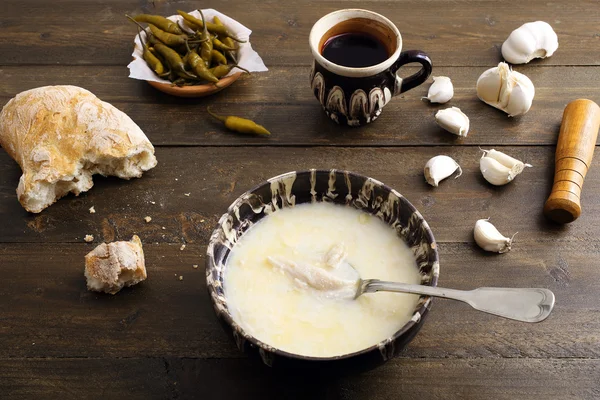 Tripe soup on rustic wooden table — Stock Image Tripe soup on rustic wooden table Royalty Free Stock Images