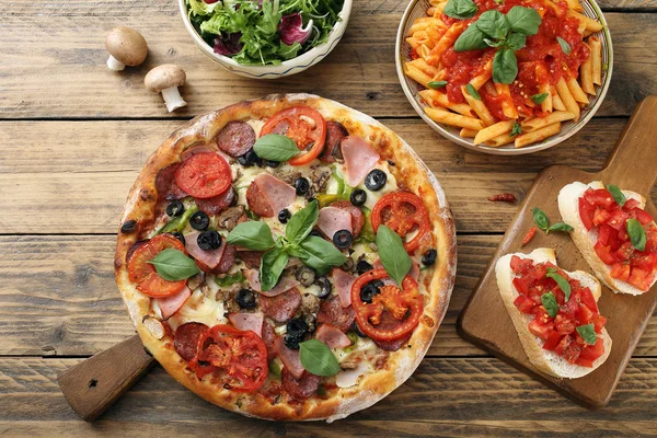 Top view  pizza  pasta and salad bowl — Stock Photo, Image