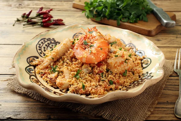 Traditional ethnic fresh couscous with fish — Stock Photo, Image