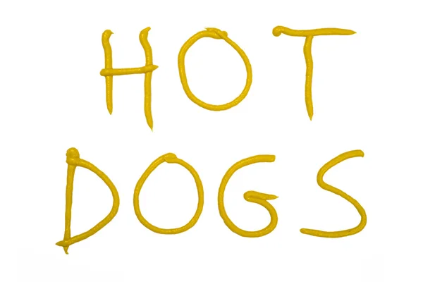 Palavras "HOT DOG" escrito com mostarda — Fotografia de Stock