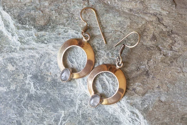 Brass Metal Earrings Ornamental Shape Hanging Neutral Background — Stock Photo, Image