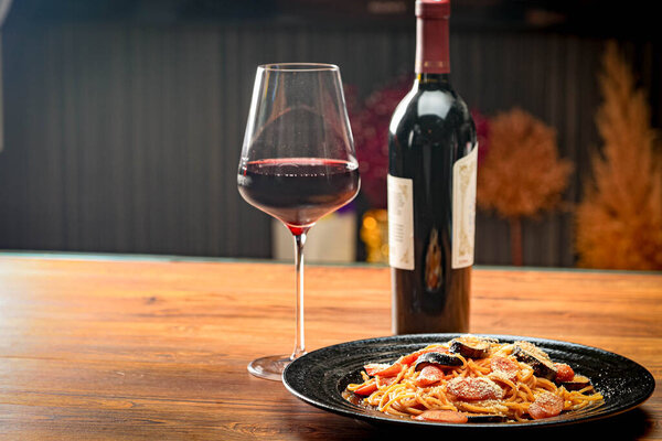 Pasta with delicious red wine and tomato sauce