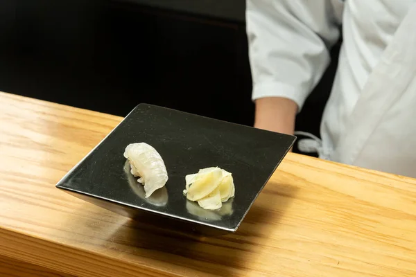 Sushi cooked by Japanese sushi chefs
