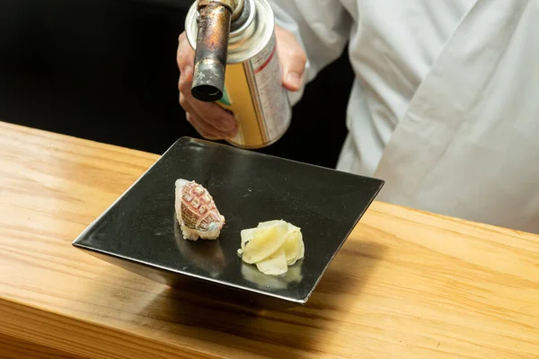 Sushi cooked by Japanese sushi chefs