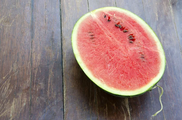 Melón sobre una madera — Foto de Stock