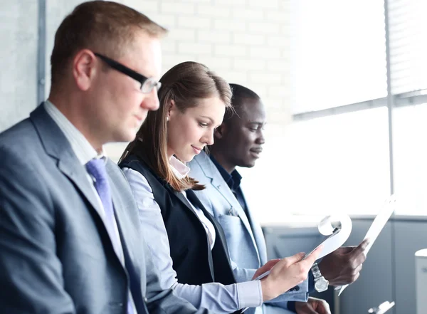 Businesswoman at seminar with her colleagues — Stock Photo, Image