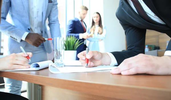Image of business team sitting at the table — Stock Photo, Image
