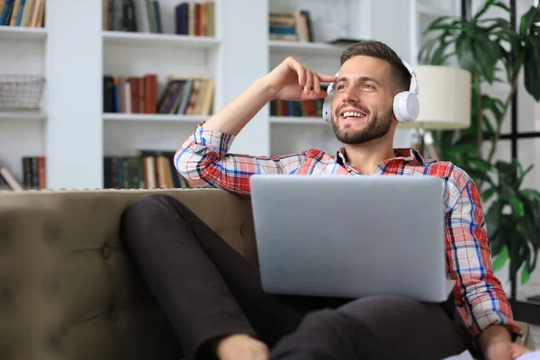 Young Tired Freelancer Casualwear Sitting Sofa Front Laptop — Stock Photo, Image