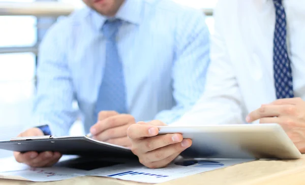 Business adviser analyzing financial figures — Stock Photo, Image